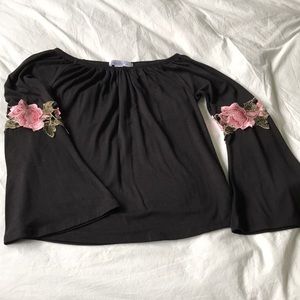 Off the shoulder bell sleeve top with flower lace